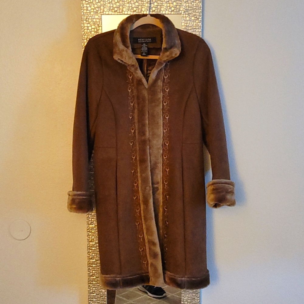 Never worn very unique  Womens New York & Co.  long coat.